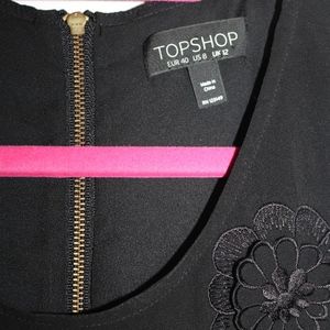 Top shop black top with flower appliqué